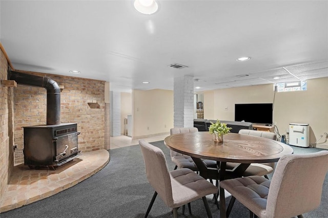 3914 38th St, Pulaski Twp, PA 15066 - carpeted dining space with a wood stove, recessed lighting, and ornate columns