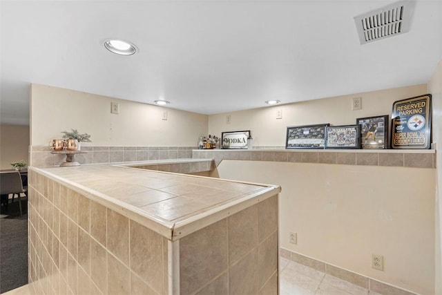 3914 38th St, Pulaski Twp, PA 15066 - kitchen featuring tile countertops, light brown cabinets, light tile patterned floors, and recessed lighting