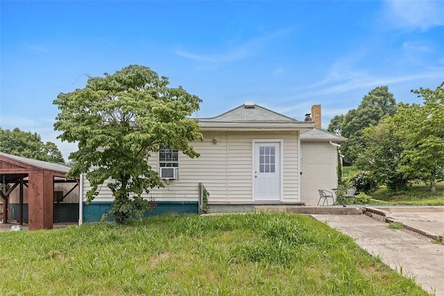 3914 38th St, Pulaski Twp, PA 15066 - back of property with a chimney and cooling unit
