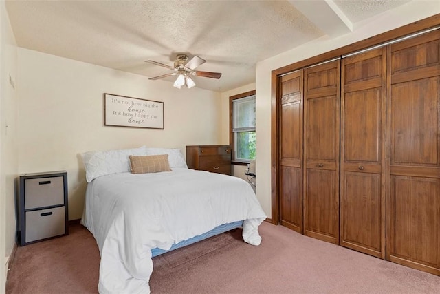 3914 38th St, Pulaski Twp, PA 15066 - bedroom featuring carpet floors, a textured ceiling, a closet, and a ceiling fan