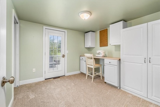 115 Nursery Rd, Forward Twp, PA 16053 - home office with light colored carpet and built in study area