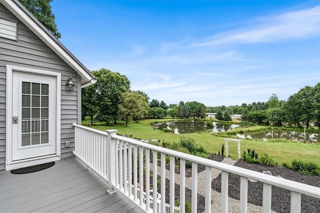 115 Nursery Rd, Forward Twp, PA 16053 - wooden deck with a water view, a lawn, and view of wooded area