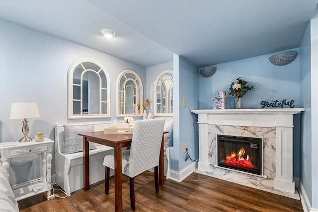 115 Nursery Rd, Forward Twp, PA 16053 - dining space with wood finished floors and a fireplace