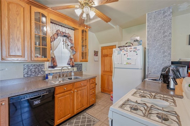 2913 Willett Rd, Brentwood, PA 15227 - kitchen featuring dishwasher, freestanding refrigerator, a ceiling fan, glass insert cabinets, and vaulted ceiling