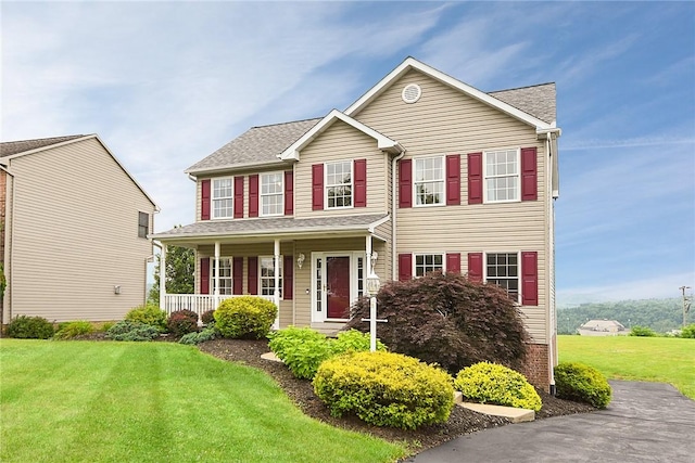 538 Bluegrass Dr, Canonsburg, PA 15317 - view of front of property featuring covered porch, a front lawn, and a shingled roof