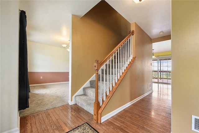 538 Bluegrass Dr, Canonsburg, PA 15317 - staircase featuring wood finished floors and baseboards