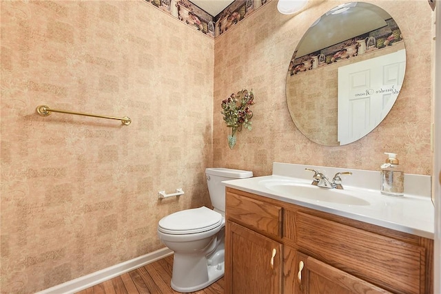 538 Bluegrass Dr, Canonsburg, PA 15317 - half bath with wood finished floors, vanity, and wallpapered walls