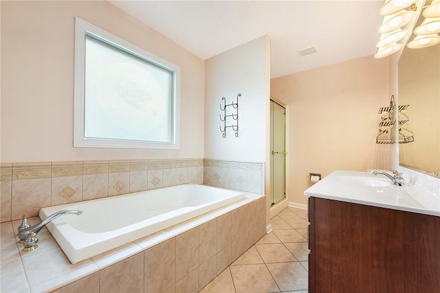 538 Bluegrass Dr, Canonsburg, PA 15317 - bathroom featuring a garden tub, tile patterned floors, vanity, a stall shower, and a chandelier