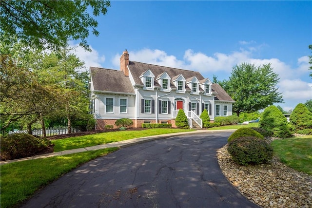 538 Bluegrass Dr, Canonsburg, PA 15317 - cape cod-style house with a chimney and asphalt driveway