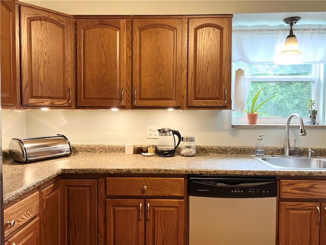 1069 Martin Ave, New Kensington, PA 15068 - kitchen with dishwasher and brown cabinetry