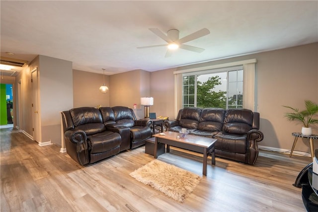 43 Dover Rd, Penn Twp, PA 15642 - living area featuring wood finished floors, a ceiling fan, and attic access
