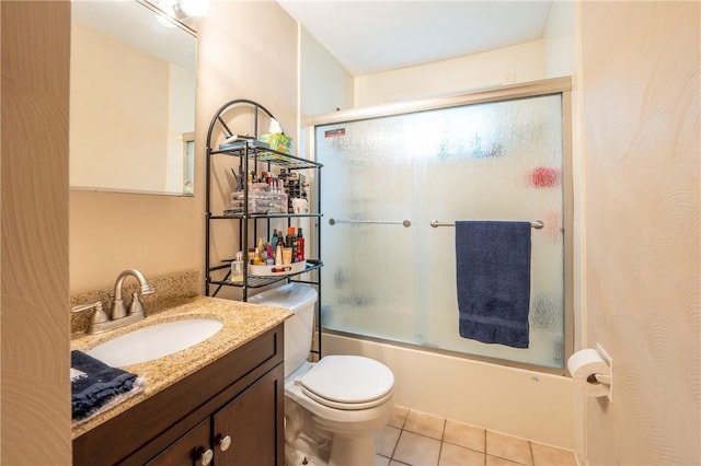 43 Dover Rd, Penn Twp, PA 15642 - full bathroom featuring vanity, tile patterned flooring, and combined bath / shower with glass door