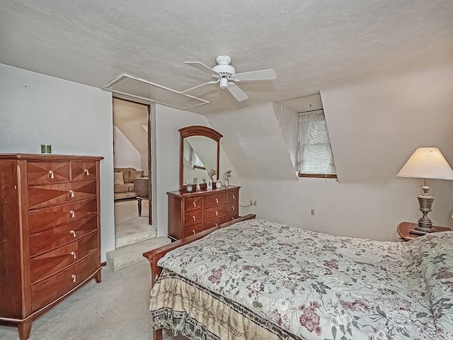 881 Ridge Rd, Harmony Twp, PA 15003 - bedroom featuring carpet floors, a textured ceiling, lofted ceiling, attic access, and a ceiling fan
