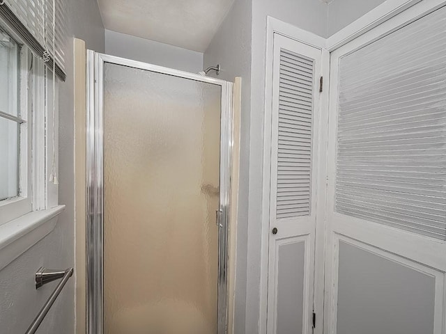 881 Ridge Rd, Harmony Twp, PA 15003 - bathroom featuring a stall shower and a closet