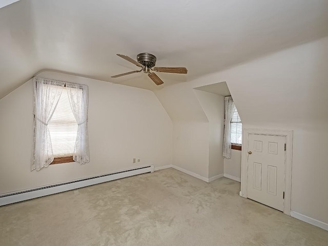 881 Ridge Rd, Harmony Twp, PA 15003 - bonus room with baseboard heating, vaulted ceiling, a ceiling fan, and carpet