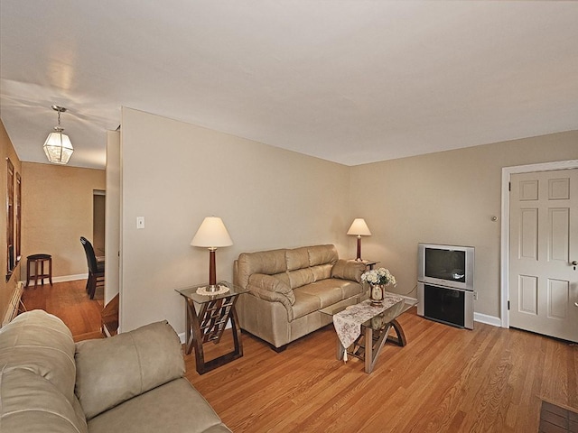 881 Ridge Rd, Harmony Twp, PA 15003 - living room with light wood finished floors and baseboards