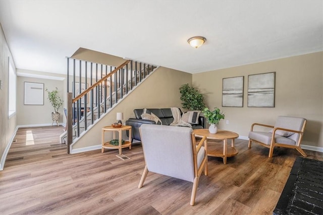 7321 Ringertown Rd, Murrysville, PA 15632 - living area with stairs and wood finished floors