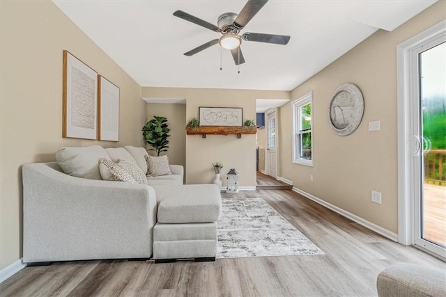 7321 Ringertown Rd, Murrysville, PA 15632 - living area with wood finished floors and ceiling fan