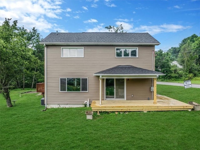 7321 Ringertown Rd, Murrysville, PA 15632 - back of house featuring a wooden deck, a lawn, and a shingled roof