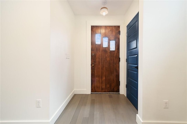 233 E 21st Ave, Munhall, PA 15120 - doorway with wood finished floors and baseboards
