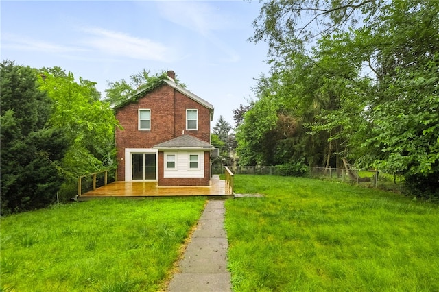 233 E 21st Ave, Munhall, PA 15120 - back of property featuring brick siding, a deck, and a chimney