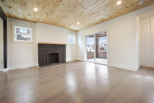 233 E 21st Ave, Munhall, PA 15120 - unfurnished living room featuring recessed lighting, wooden ceiling, a fireplace, and wood finished floors