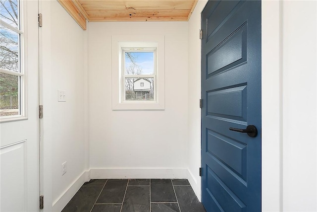 233 E 21st Ave, Munhall, PA 15120 - doorway featuring wooden ceiling and dark tile patterned floors