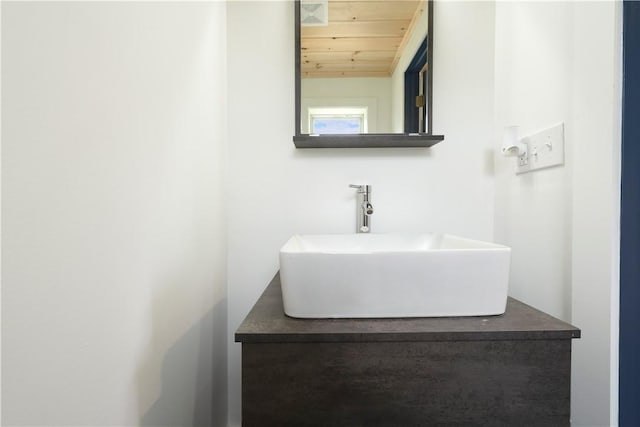 233 E 21st Ave, Munhall, PA 15120 - bathroom featuring wood ceiling and a sink