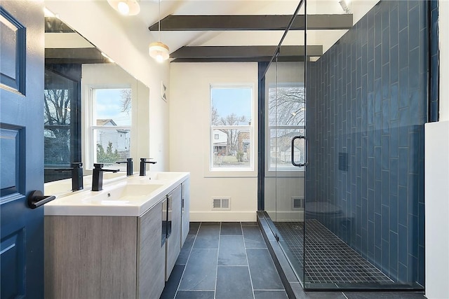 233 E 21st Ave, Munhall, PA 15120 - bathroom featuring double vanity, a shower stall, tile patterned floors, healthy amount of natural light, and beam ceiling