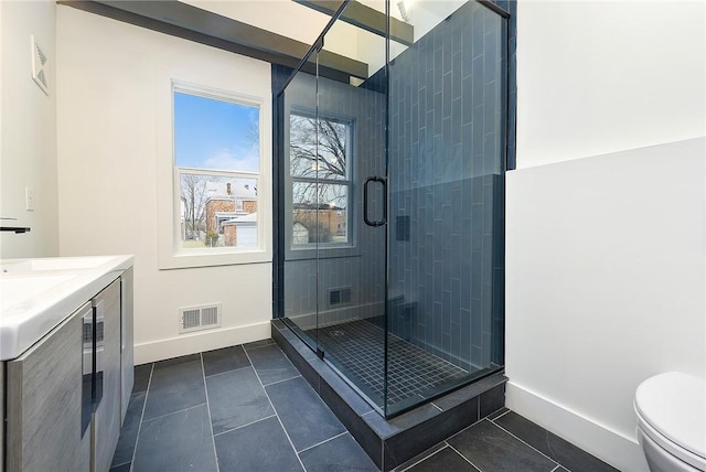 233 E 21st Ave, Munhall, PA 15120 - full bath with a shower stall, vanity, and tile patterned floors