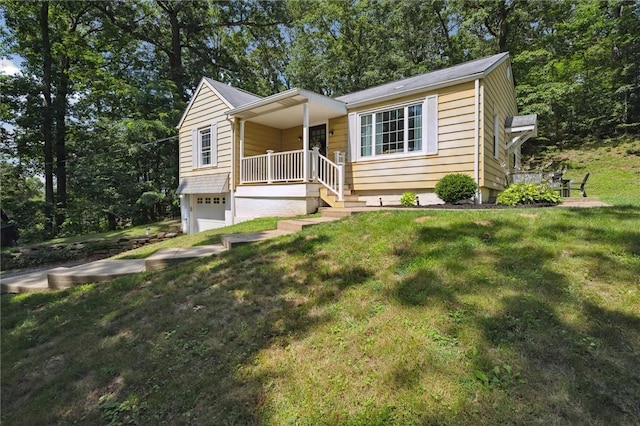 516 Shenango Rd, Chippewa Twp, PA 15010 - view of front facade with a front yard, an attached garage, and view of scattered trees