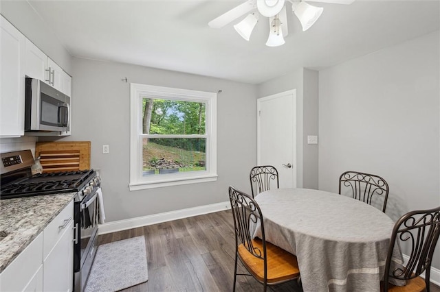 516 Shenango Rd, Chippewa Twp, PA 15010 - dining space featuring dark wood-style floors and ceiling fan