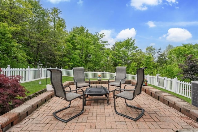 1544 Eldorado Dr, Hopewell Twp, PA 15001 - view of patio with a fire pit and view of scattered trees
