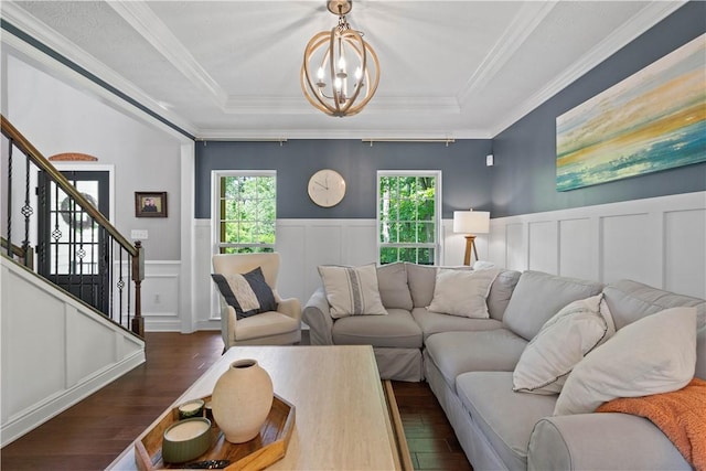 237 Clever Rd, Robinson Twp, PA 15136 - living area featuring dark wood-type flooring, a chandelier, a tray ceiling, stairs, and a decorative wall