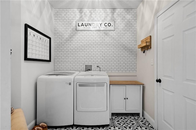 237 Clever Rd, Robinson Twp, PA 15136 - washroom featuring cabinet space, washing machine and dryer, and tile patterned floors