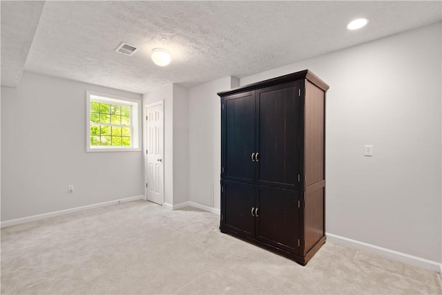 237 Clever Rd, Robinson Twp, PA 15136 - unfurnished bedroom with light colored carpet, a textured ceiling, and recessed lighting
