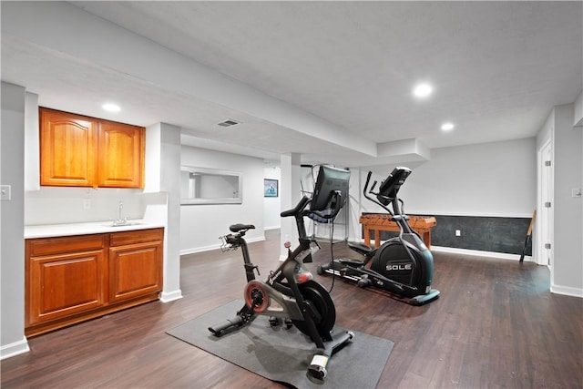237 Clever Rd, Robinson Twp, PA 15136 - workout room featuring dark wood-type flooring, recessed lighting, and bar with sink