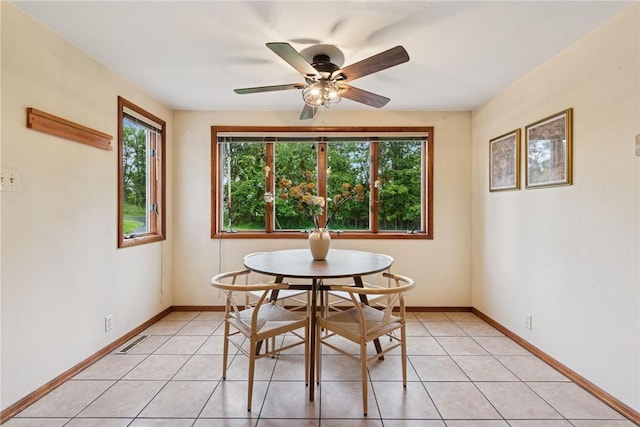 110 Four Seasons Ln, Irwin, PA 15642 - dining area with light tile patterned floors and a ceiling fan
