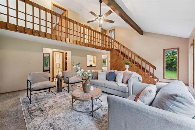 110 Four Seasons Ln, Irwin, PA 15642 - carpeted living room with stairway, a ceiling fan, beam ceiling, and high vaulted ceiling