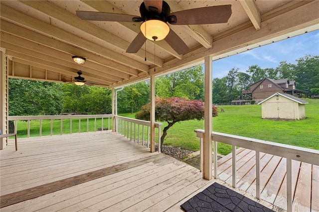 110 Four Seasons Ln, Irwin, PA 15642 - wooden deck featuring ceiling fan, a shed, and a lawn
