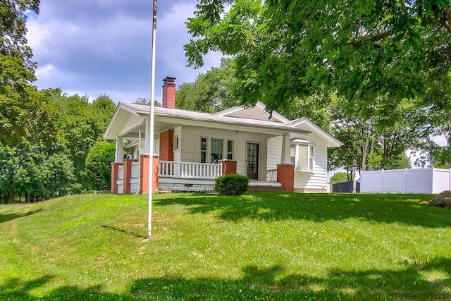 3444 Brodhead Rd, Center Twp, PA 15061 - view of front facade featuring a porch and a chimney
