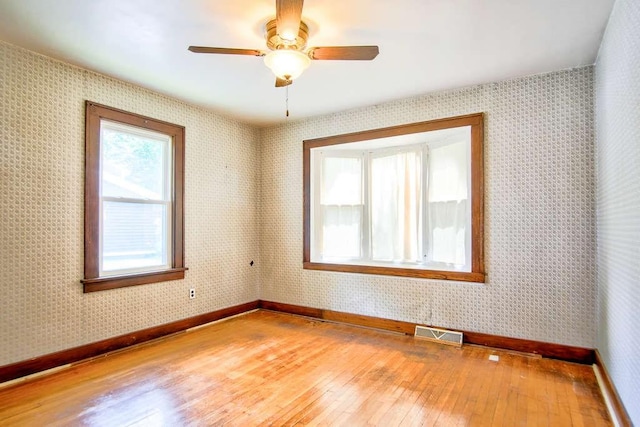3444 Brodhead Rd, Center Twp, PA 15061 - spare room with hardwood / wood-style floors, wallpapered walls, and a ceiling fan