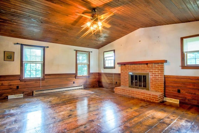 3444 Brodhead Rd, Center Twp, PA 15061 - unfurnished living room featuring baseboard heating, ceiling fan, wainscoting, hardwood / wood-style floors, and a fireplace