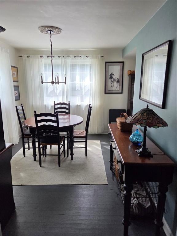 106 6th Ave, Ross Twp, PA 15229 - dining room featuring a chandelier and wood finished floors