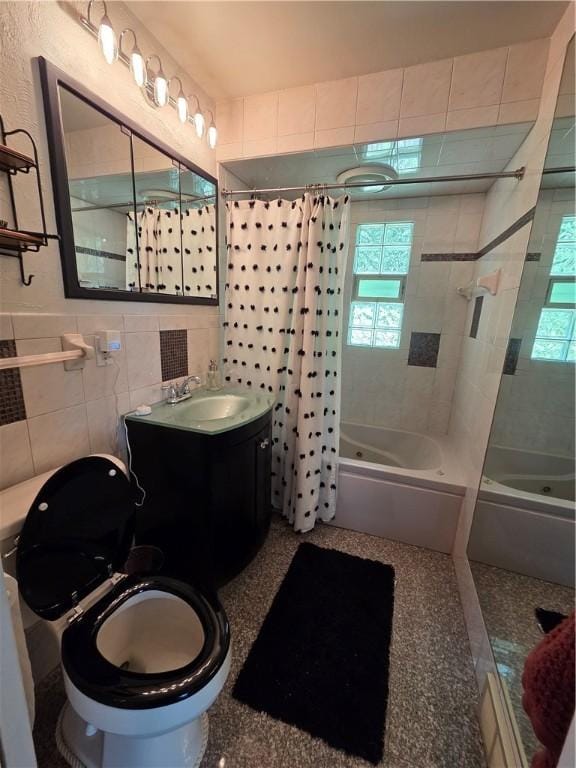 106 6th Ave, Ross Twp, PA 15229 - full bathroom with shower / bath combo with shower curtain, tile walls, vanity, and healthy amount of natural light