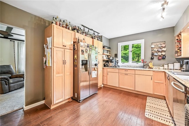 2725 N Neshannock Rd, Sharpsville, PA 16150 - kitchen with stainless steel appliances, light brown cabinetry, dark wood finished floors, light stone countertops, and open floor plan