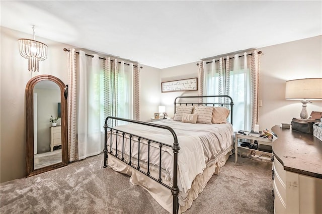 2725 N Neshannock Rd, Sharpsville, PA 16150 - carpeted bedroom featuring a chandelier