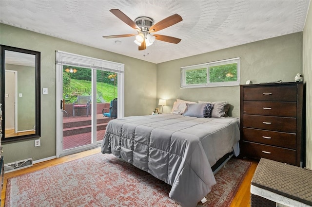 4 Thornridge Rd, Kilbuck Twp, PA 15202 - bedroom with wood finished floors, access to exterior, and a ceiling fan