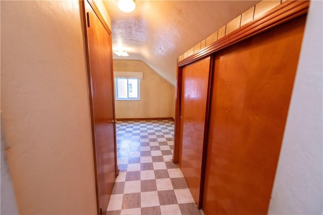 1819 Sundeman St, Troy Hill, PA 15212 - hallway with tile patterned floors and lofted ceiling