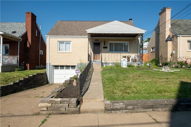 1819 Sundeman St, Troy Hill, PA 15212 - view of front of property with brick siding, a garage, driveway, a front yard, and covered porch